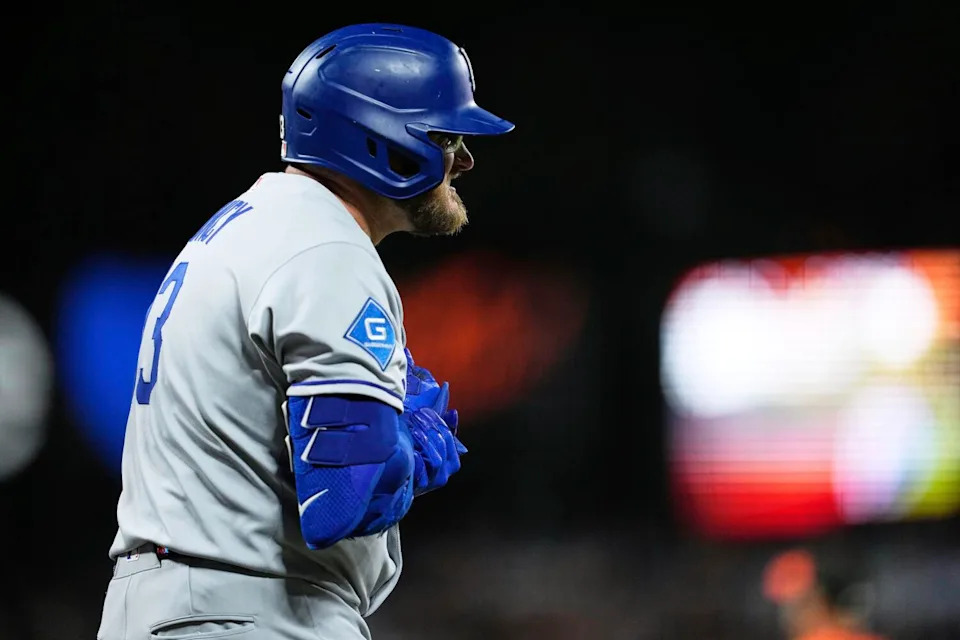 Dodgers third baseman Max Muncy reacts after being hit by a pitch during the eighth inning Friday.
