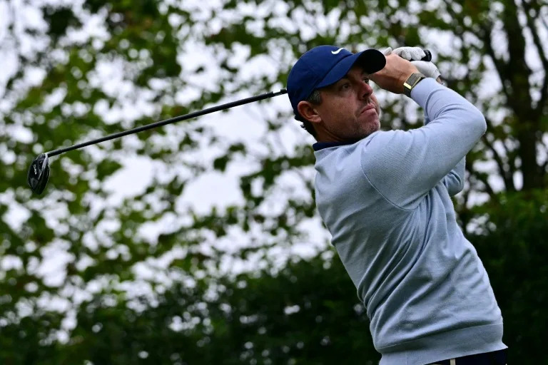 McIlroy on the charge at PGA Championship as Reed withdraws