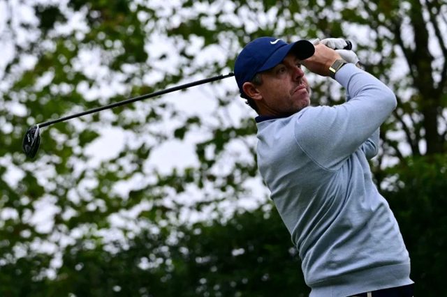 McIlroy on the charge at PGA Championship as Reed withdraws