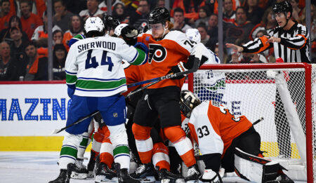 Flyers flat in home opener, shut out by Canucks