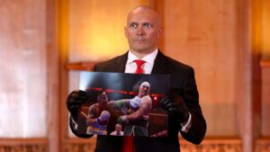 Usyk asks Fury to sign photo of him being punched in face