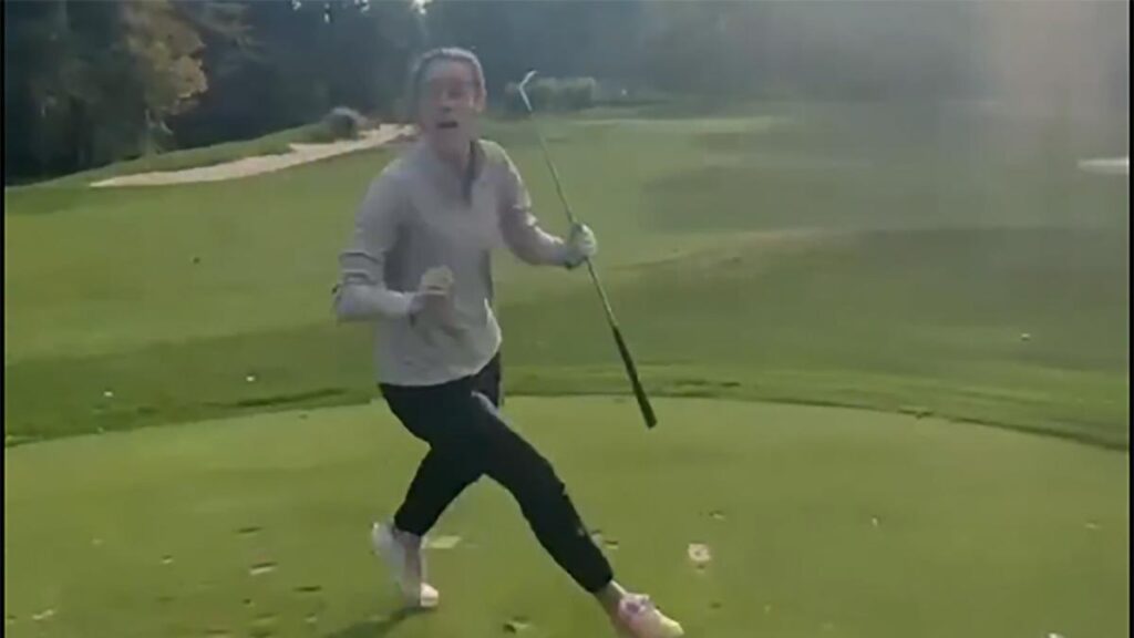 Caitlin Clark celebrates after near ace during golf-filled offseason