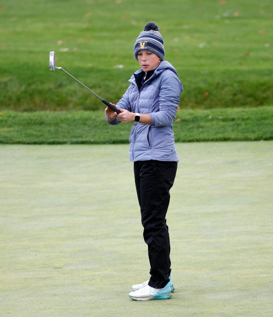 Through wind and cold and sometimes rain, Victor junior runs away with girls golf title