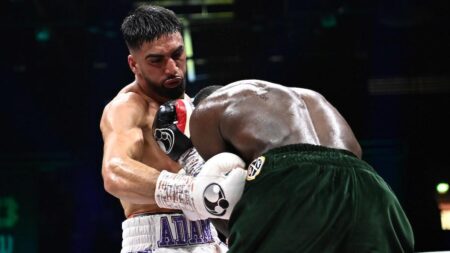 Clinical Azim stops Davies in eighth round