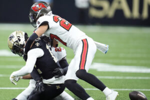 Chris Olave leaves Saints-Bucs game after violent helmet-to-helmet hit on play that leads to Bucs defensive TD