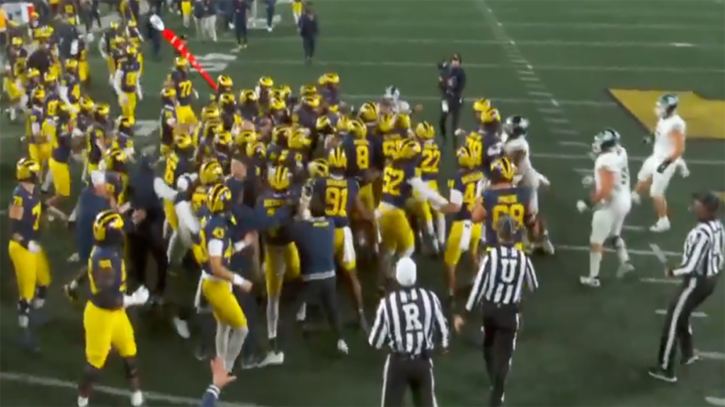 WATCH: Fight breaks out between Michigan, Michigan State players as Wolverines kneel to seal rivalry win