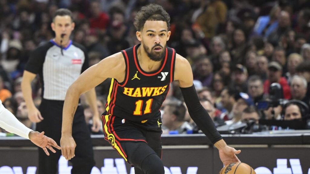 Trae Young’s 22 assists help Hawks stun Cavailiers 135-124, only Cleveland’s 2nd loss this season