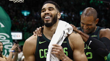 Tatum reacts to buzzer-beating shot to defeat Raptors in overtime