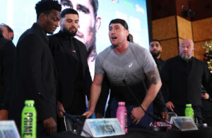 Tommy Fury vs. Darren Till news conference erupts into chaos after John Fury hurls water bottle