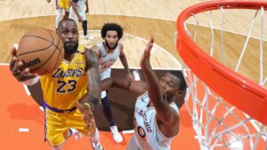 James’ triple-double helps Lakers see off Spurs