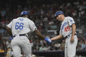 Chris Woodward rejoins Dodgers staff as new first base coach