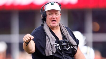 WATCH: Biff Poggi visits Charlotte football practice after midseason firing, gets warm reception from players