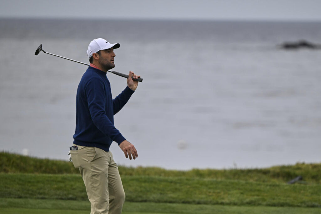 Scottie Scheffler’s day on the beach leads to a par-saving end to his round