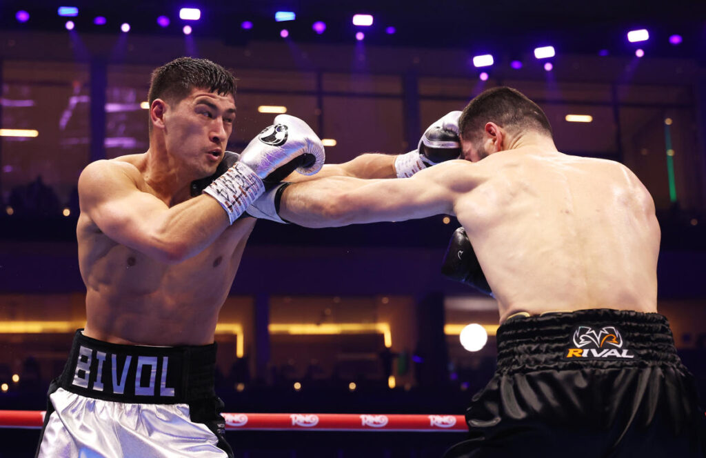 Dmitry Bivol edges Artur Beterbiev in brilliant rematch to win undisputed light heavyweight title