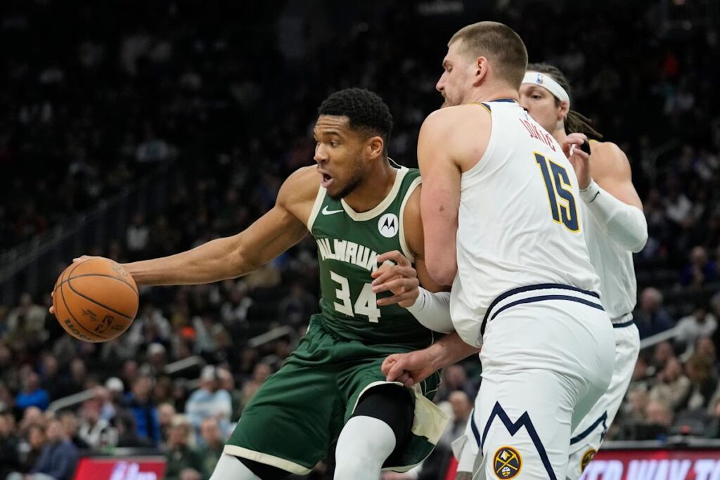 Giannis Antetokounmpo’s 28 points, 19 rebounds lead Bucks to 121-112 win over Nuggets