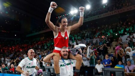 Imane Khelif says she will ‘stand firm’ following legal action after winning Olympic gold