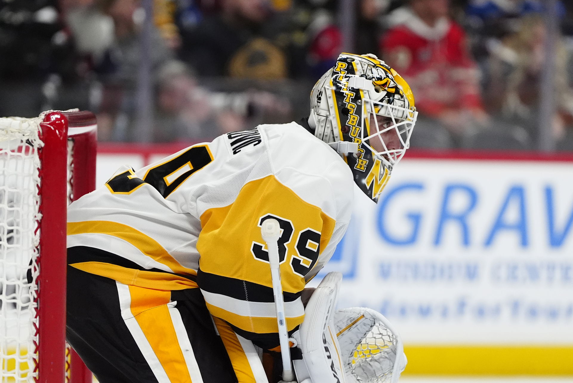 Mar 4, 2025; Denver, Colorado, USA; Pittsburgh Penguins goaltender Alex Nedeljkovic (39) in net in the second period against the Colorado Avalanche at Ball Arena. (Ron Chenoy-Imagn Images)