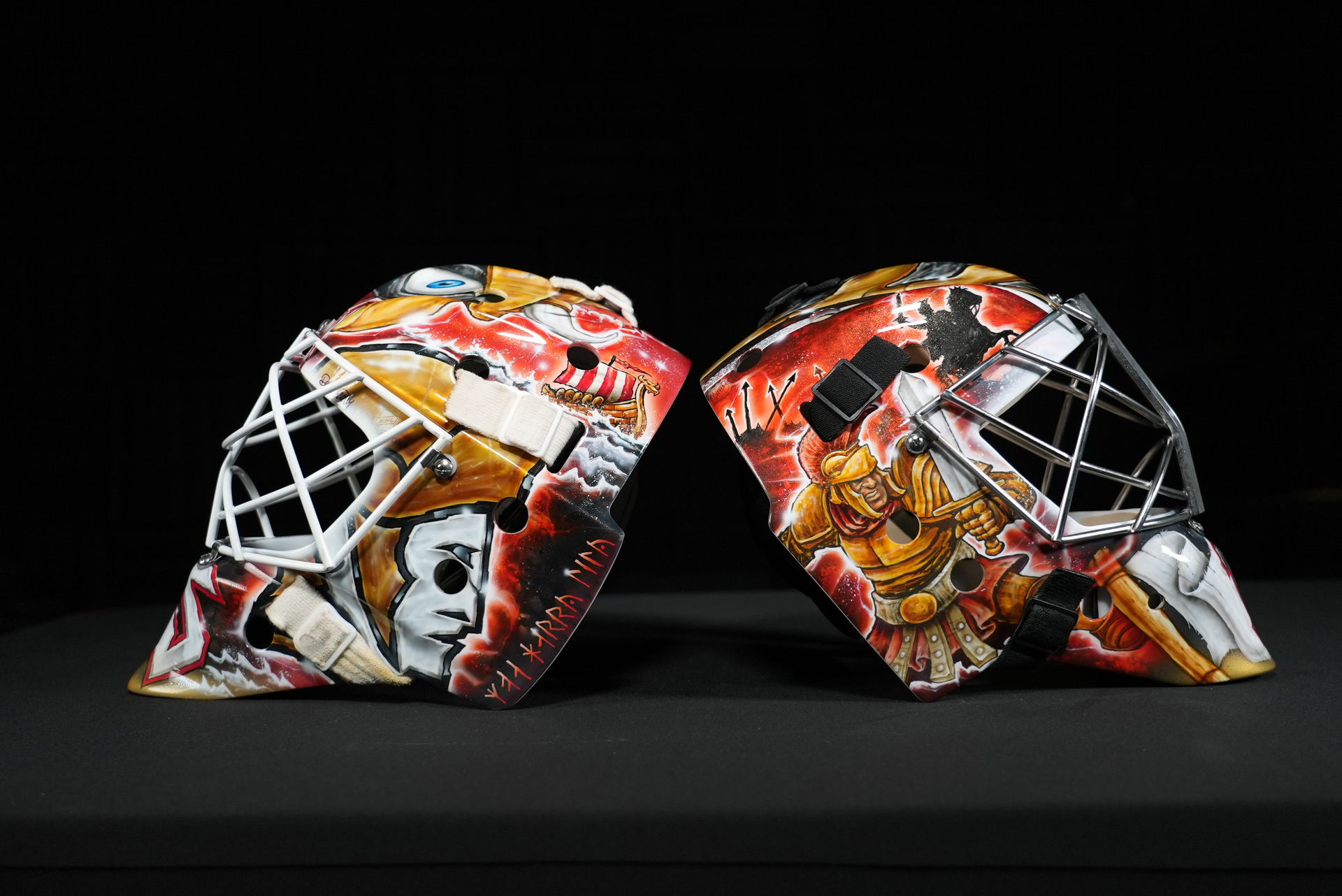 The masks of Linus Ullmark (left) and Leevi Merilainen, designed by Dave Gunnarsson from DaveArt (Photos: Daniel Chisholm).