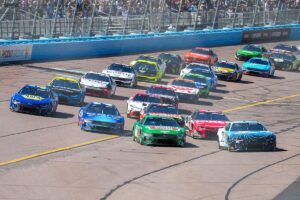 Christopher Bell holds off Denny Hamlin at Phoenix to win third straight NASCAR Cup Series race