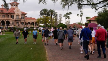 Players Championship: Storms and lightning suspend tense final round