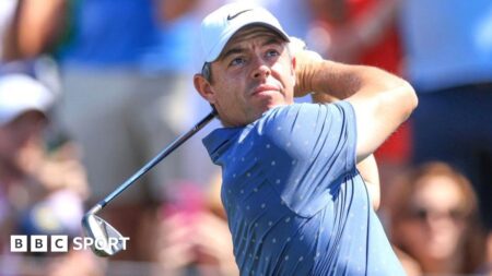 The Players Championship: JJ Spaun leads as Rory McIlroy and others slip back in windy conditions