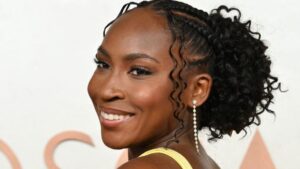 Coco Gauff shines bright in shiny yellow Miu Miu gown and braided hairstyle at 2025 Oscars