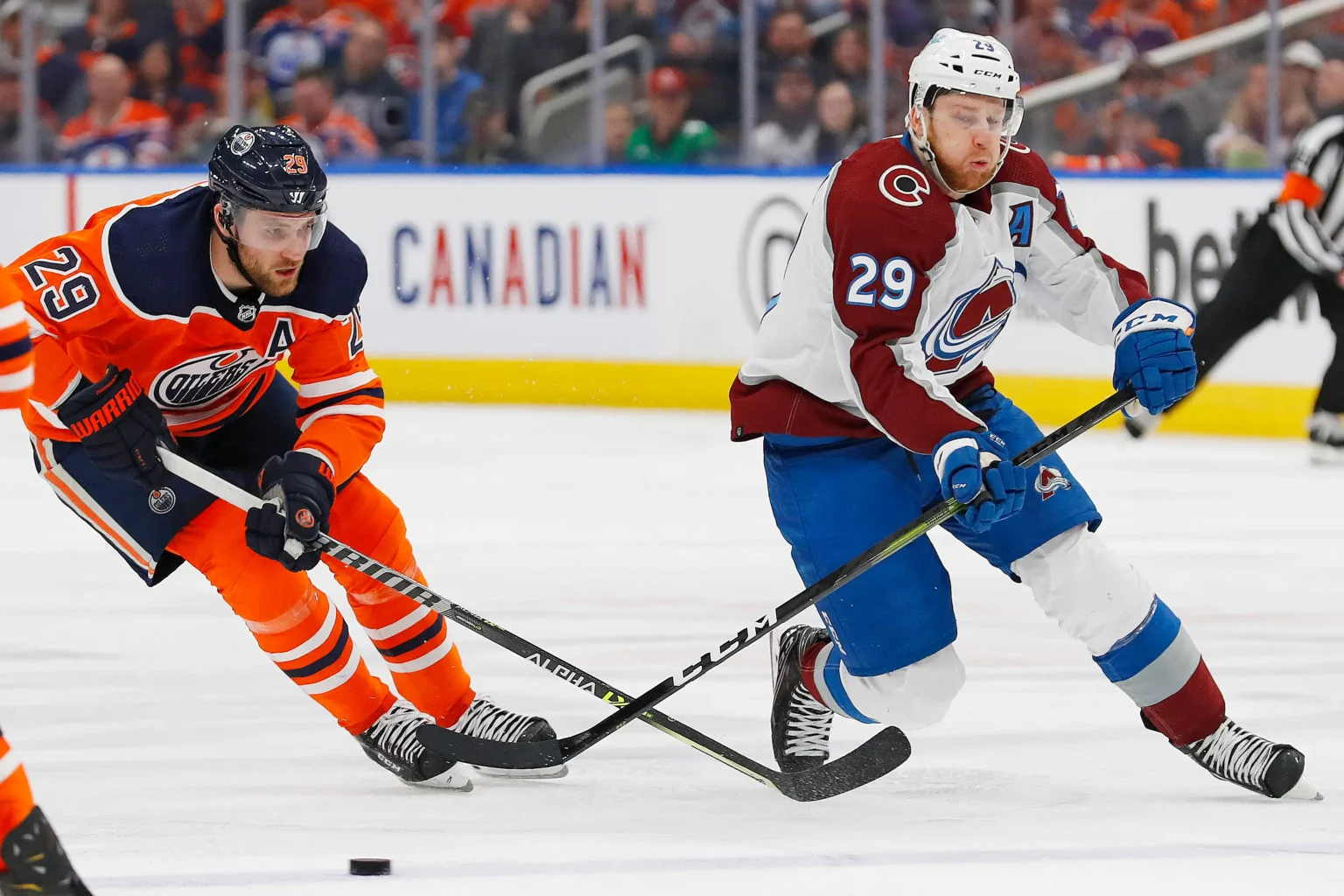 MacKinnon or Draisaitl? Predicting Who Prevails in Tight Art Ross Trophy Race