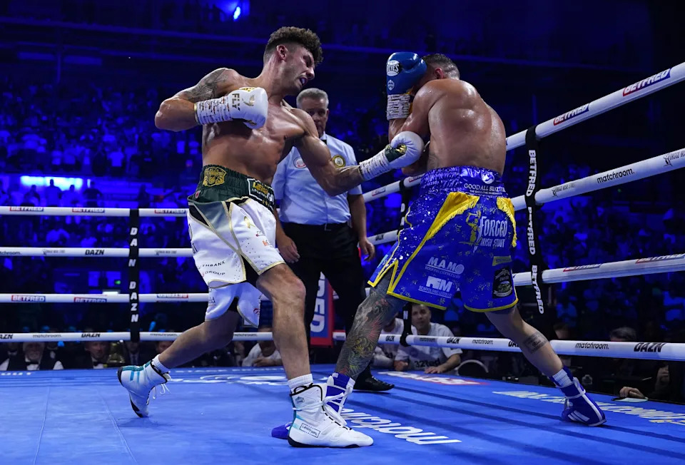 Josh Warrington (right) and Leigh Wood in action during their WBA Featherweight World Title contest at Utilita Arena Sheffield. Picture date: Saturday October 7, 2023. (Photo by Nick Potts/PA Images via Getty Images)
