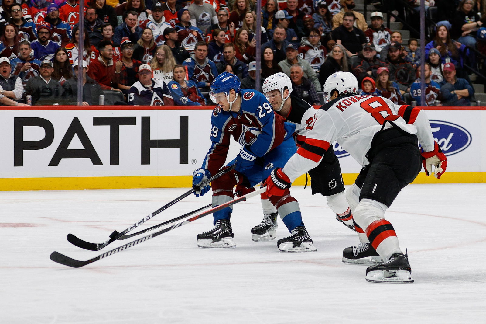 Nathan MacKinnon, Brett Pesce and Johnathan Kovacevic (Isaiah J. Downing-Imagn Images)