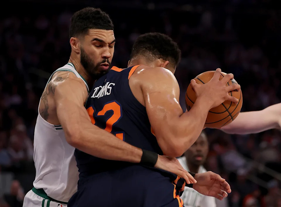 NEW YORK, NEW YORK - MAY 12: Karl-Anthony Towns #32 of the New York Knicks heads for the net as Jayson Tatum #0 of the Boston Celtics defends in the first half in Game Four of the Eastern Conference Second Round NBA Playoffs at Madison Square Garden on May 12, 2025 in New York City. NOTE TO USER: User expressly acknowledges and agrees that, by downloading and or using this photograph, User is consenting to the terms and conditions of the Getty Images License Agreement. (Photo by Elsa/Getty Images). (Photo by Elsa/Getty Images)