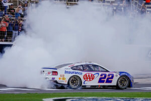 Reigning Cup champion Joey Logano gets 1st win this season in overtime at Texas