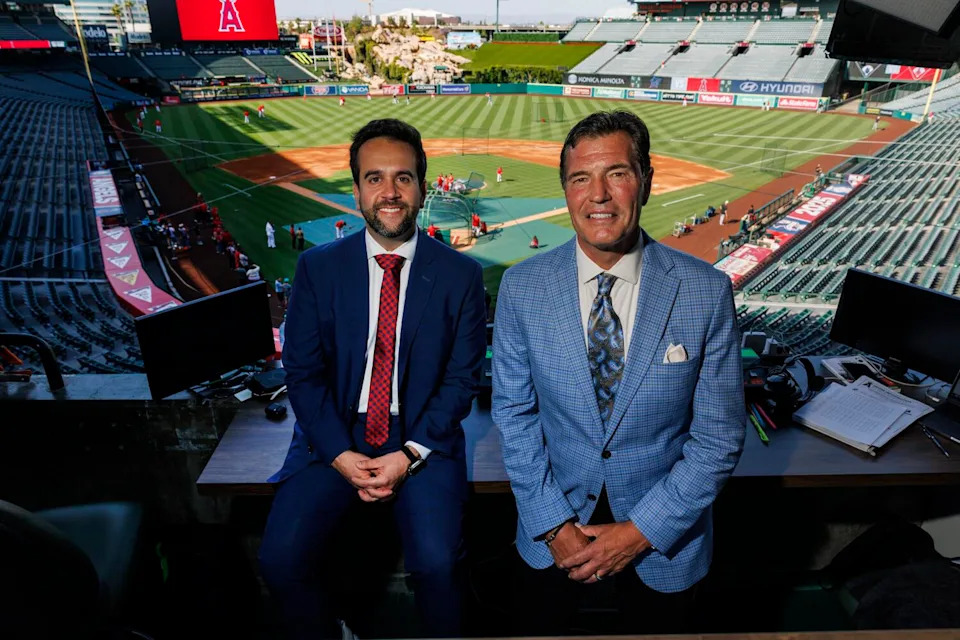 Angels broadcasters Wayne Randazzo, left and Mark Gubicza in their broadcast booth at Angel Stadium.
