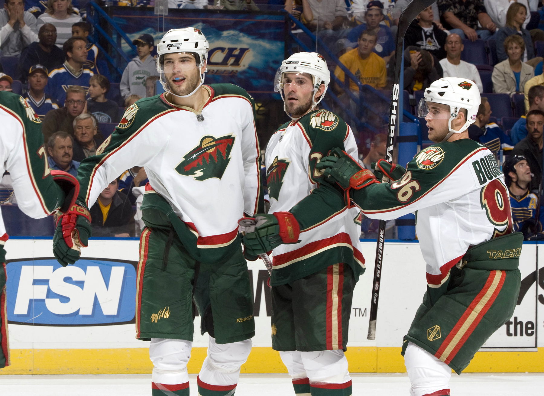 Oct 20, 2007; St. Louis, MO, USA; Minnesota Wild defenseman Brent Burns (8) is congratulated by teammates after scoring a goal against the St. Louis Blues during the third period at the Scottrade Center in St. Louis, MO. (Scott Rovak-Imagn Images)