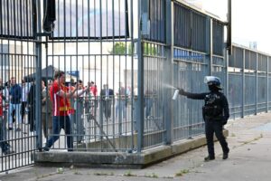 Ex-French interior minister apologises to Liverpool fans for making them a ‘scapegoat’