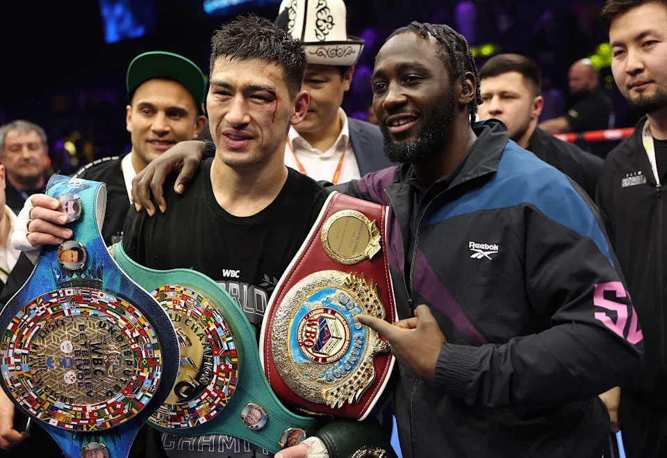 RIYADH, SAUDI ARABIA - FEBRUARY 22: Dmitrii Bivol celebrates with Terence Crawford after winning his contest with Artur Beterbiev as the main act of the Beterbiev v Bivol 2: The Last Crescendo show at Kingdom Arena on February 22, 2025 in Riyadh. (Photo by Mark Robinson/Getty Images).