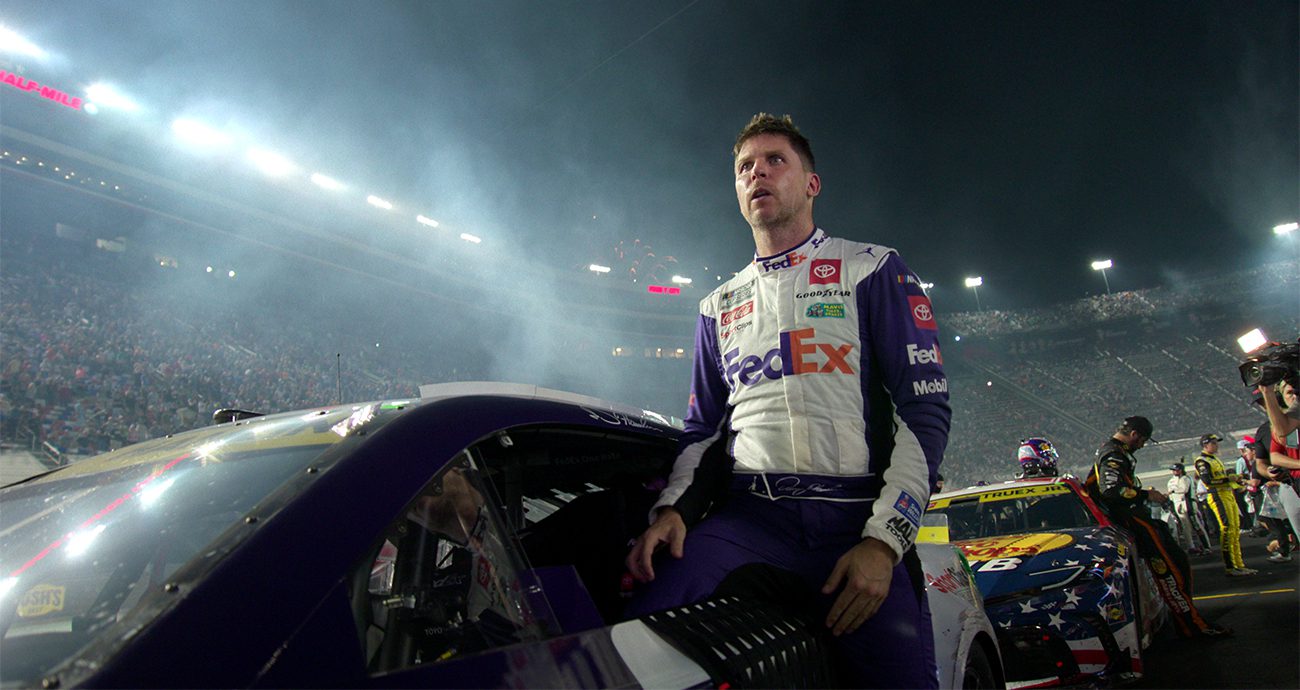 Denny Hamlin looks on