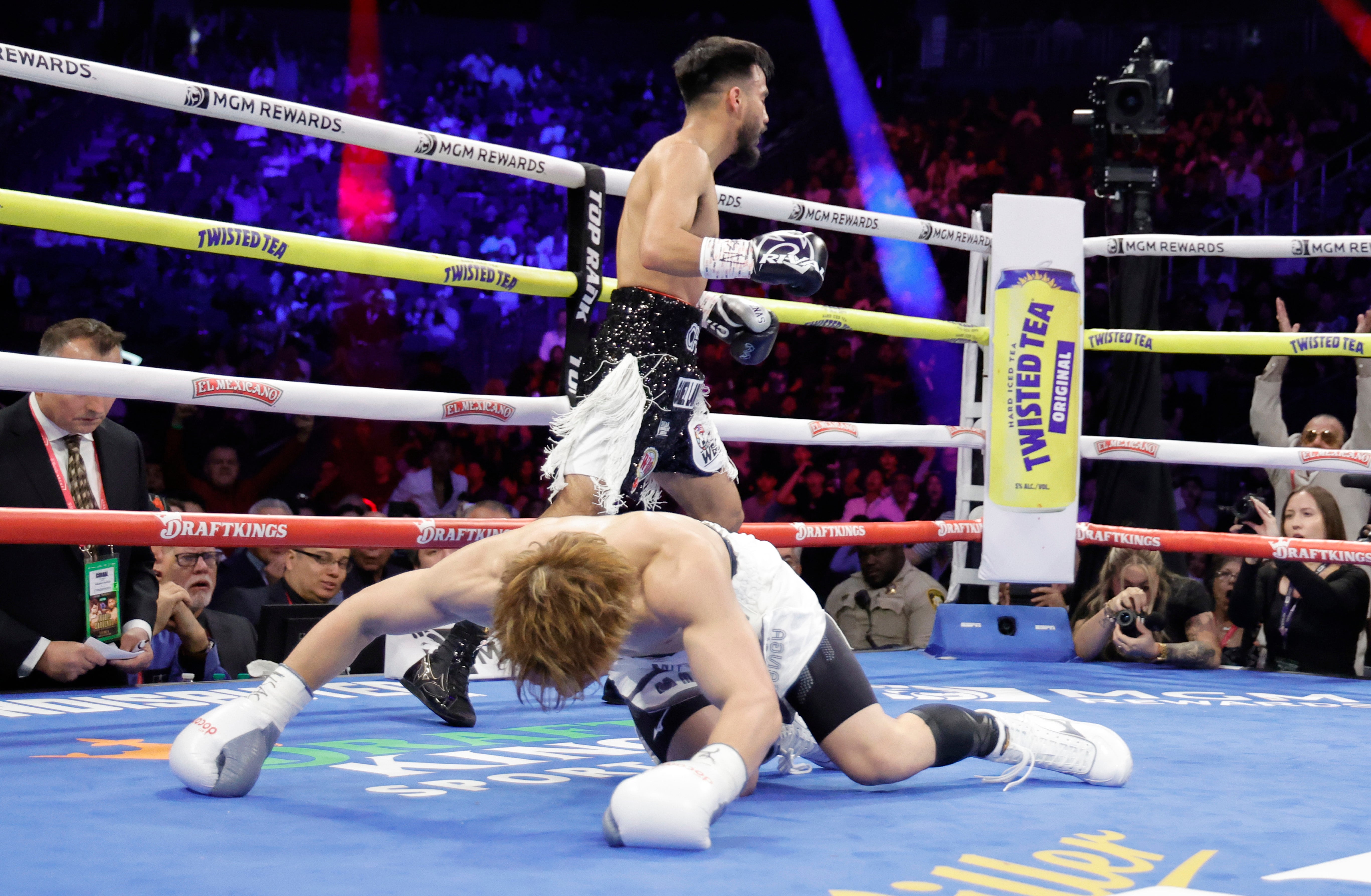 Naoya Inoue hit the canvas in the second round but eventually overcame Ramon Cardenas