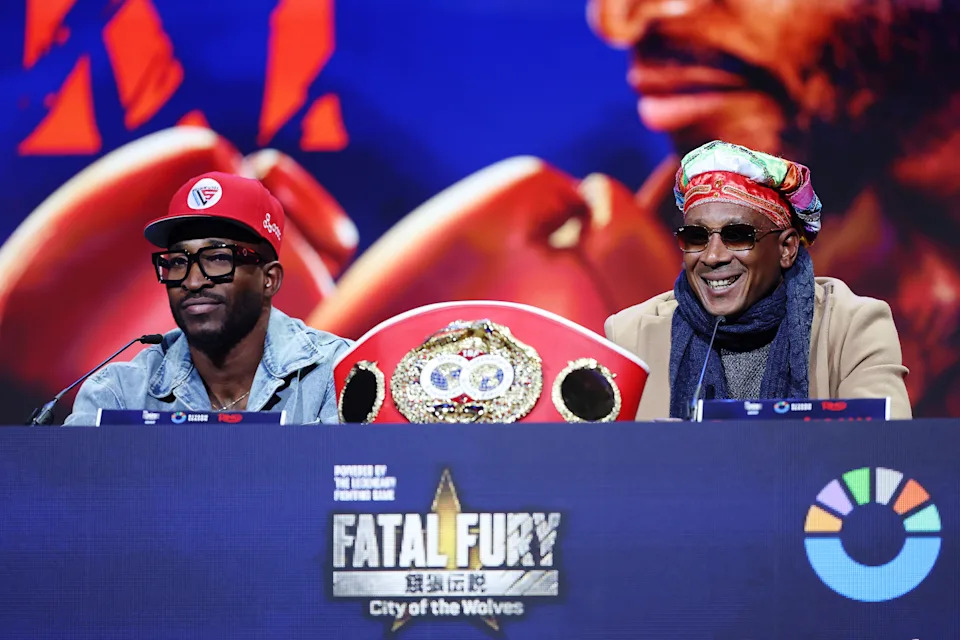NEW YORK, NEW YORK - MARCH 06: William Scull of Cuba (L) and trainer Franquis Aldama (R) speak to the crowd during their press conference with Canelo Alvarez of Mexico (not pictured) to promote their Super Middleweight World Championship fight at Radio City Music Hall on March 06, 2025 in New York City. (Photo by Sarah Stier/Getty Images)