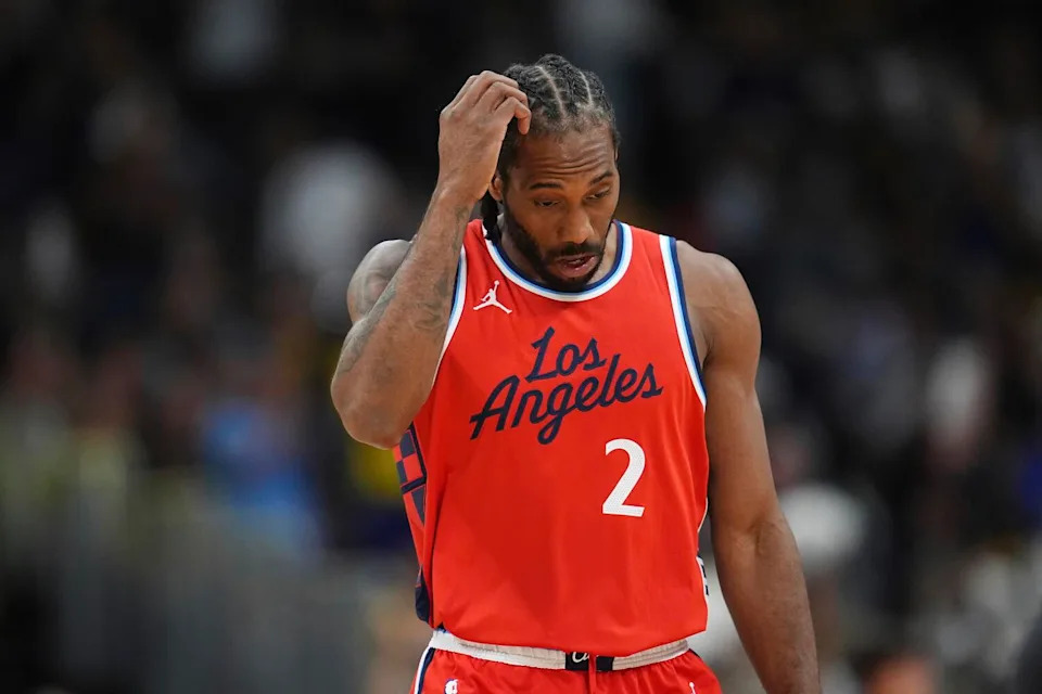 Clippers forward Kawhi Leonard heads to the bench during a timeout against the Denver Nuggets in Game 7.