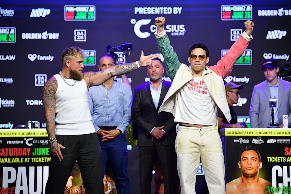 May 14, 2025; Los Angeles, California, USA; Jake Paul and Julio Cesar Chavez Jr. pose for photos following their press conference at Avalon Hollywood Theater. Mandatory Credit: Gary A. Vasquez-Imagn Images