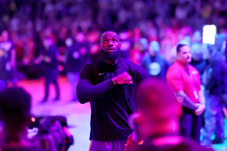 Lakers forward LeBron James taps his chest before his team faced the Timberwolves during Game 5