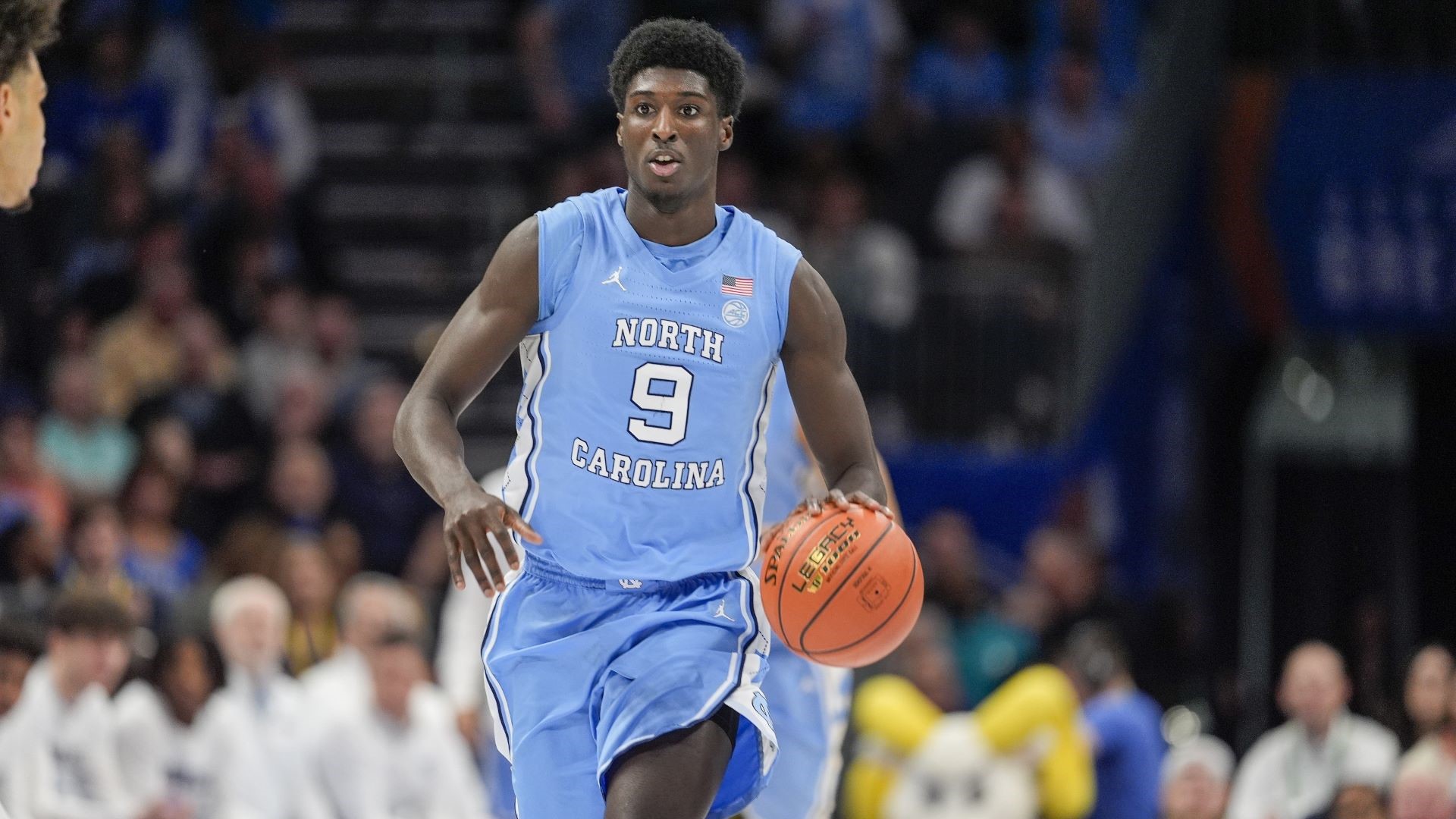 Mar 14, 2025; Charlotte, NC, USA; North Carolina Tar Heels guard Drake Powell (9) during the first half against the Duke Blue Devils at Spectrum Center.