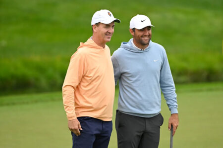 Peyton Manning hit a house with his tee shot and Scottie Scheffler couldn’t stop from laughing