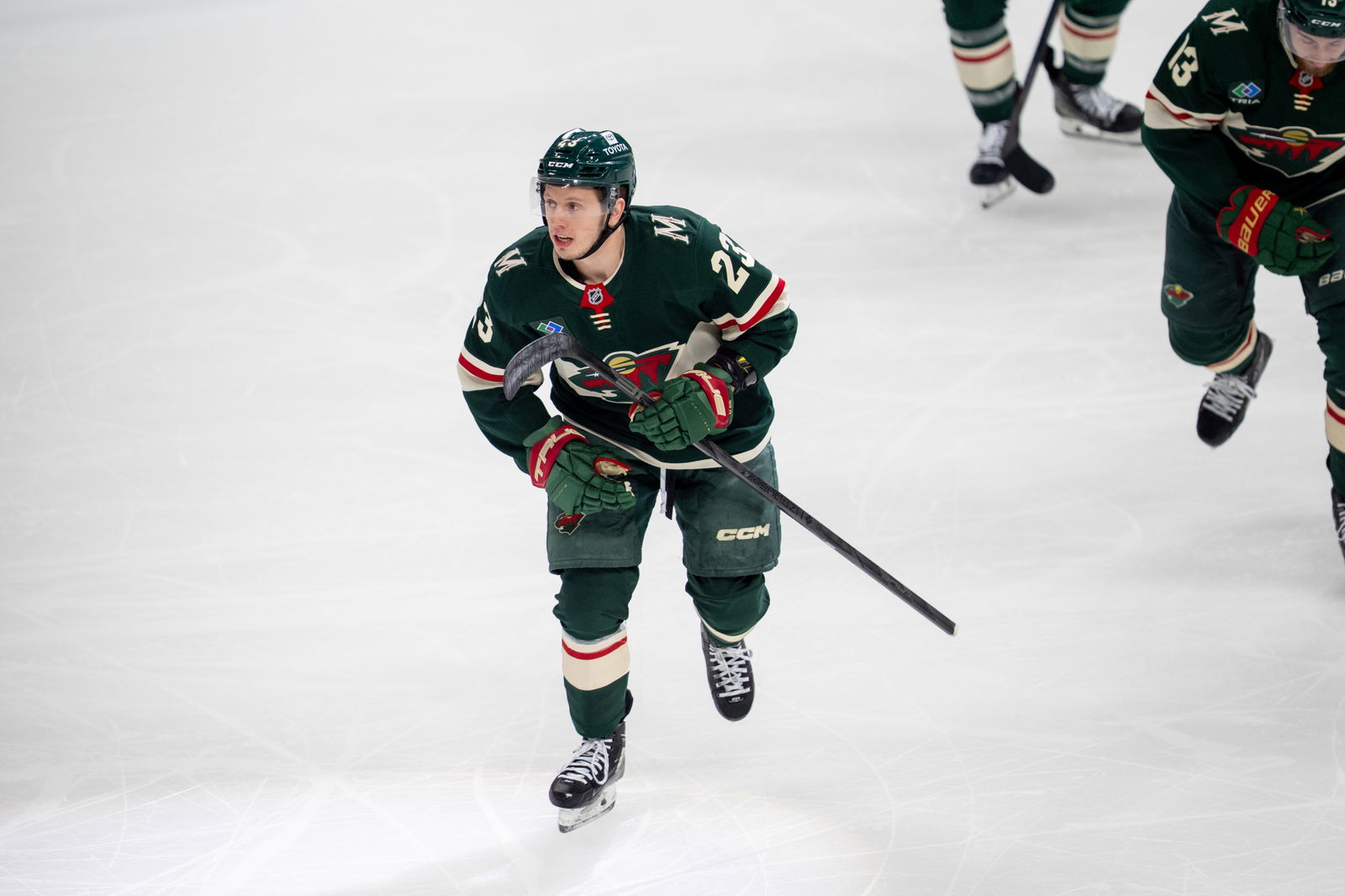 Apr 24, 2025; Saint Paul, Minnesota, USA; Minnesota Wild center Marco Rossi (23) leads the team to the bench after scoring against the Vegas Golden Knights in the first period in game three of the first round of the 2025 Stanley Cup Playoffs at Xcel Energy Center. Mandatory Credit: Matt Blewett-Imagn Images