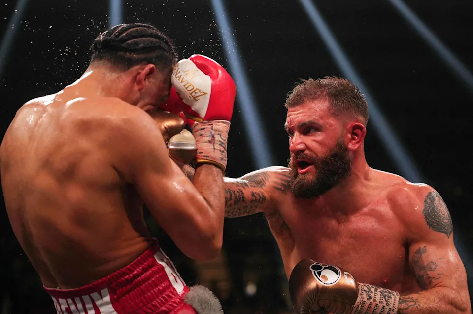 Mar 25, 2023; Las Vegas, Nevada, USA; David Benavidez (gray trunks) and Caleb Plant (brown trunks) box during their Interim WBC Super Middleweight Championship boxing bout at MGM Grand Garden Arena. Mandatory Credit: Joe Camporeale-USA TODAY Sports