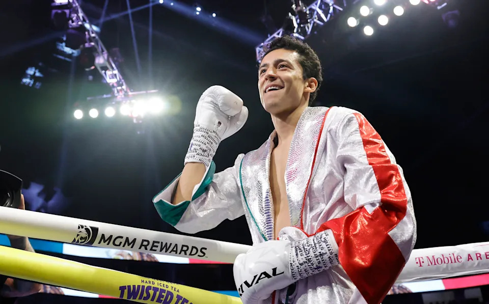 LAS VEGAS, NEVADA - MAY 04: WBO featherweight champion Rafael Espinoza reacts to the crowd before entering the ring for a title defense against Edward Vazquez at T-Mobile Arena on May 04, 2025 in Las Vegas, Nevada. Espinoza retained his title with a seventh-round TKO. (Photo by Steve Marcus/Getty Images)