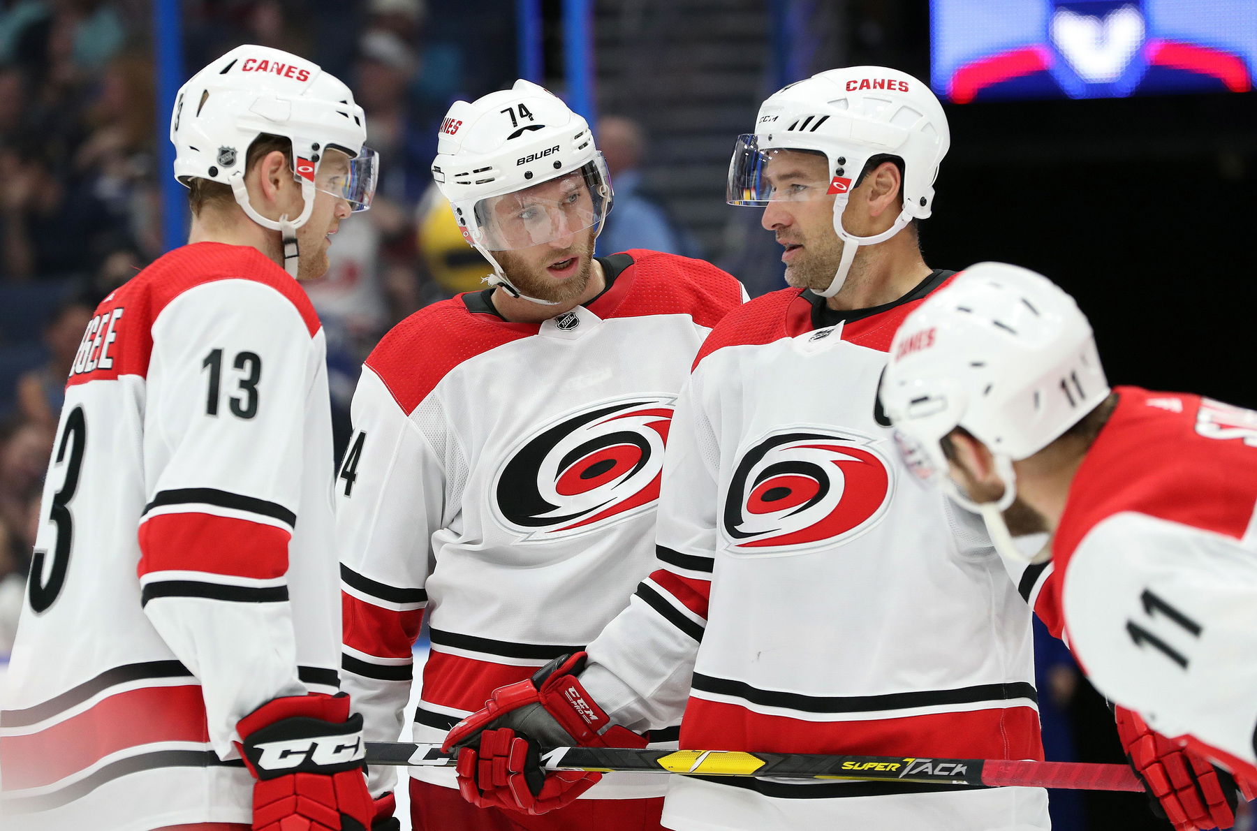 Oct 16, 2018; Tampa, FL, USA; Carolina Hurricanes defenseman Jaccob Slavin (74), right wing Justin Williams (14) left wing Warren Foegele (13), center Jordan Staal (11) during the second period at Amalie Arena. (Kim Klement-Imagn Images)