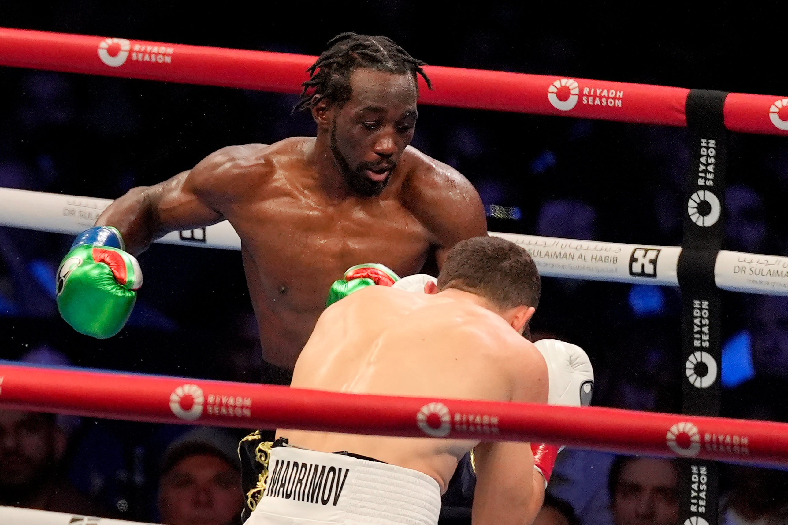 Terence Crawford picked up a super-welterweight title by outpointing Israil Madrimov, as he edged up towards super-middleweight