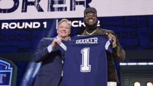 Cowboys first-round pick Tyler Booker signs his rookie contract