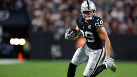 Brock Bowers not participating in offseason program yet as he finishes his degree